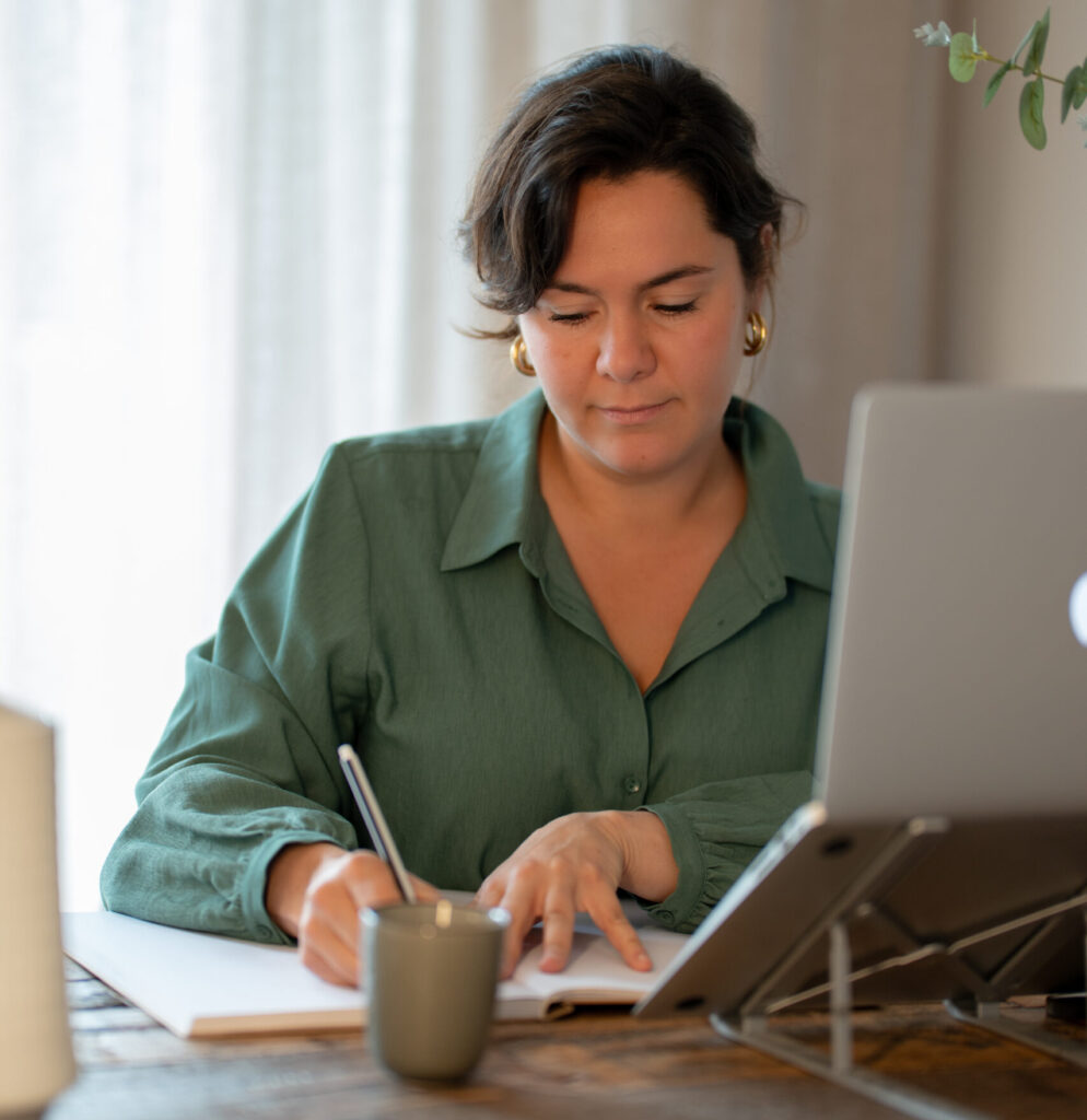 Laurie working and writing